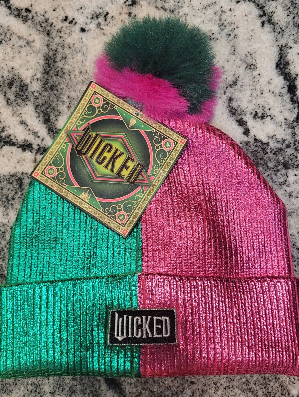 Wicked movie metallic pink green pom beanie NWT Universal Studios Glinda Elphaba